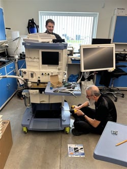 Jeff Ruiz repairing medical equipment at CURE Internationals Michigan warehouse