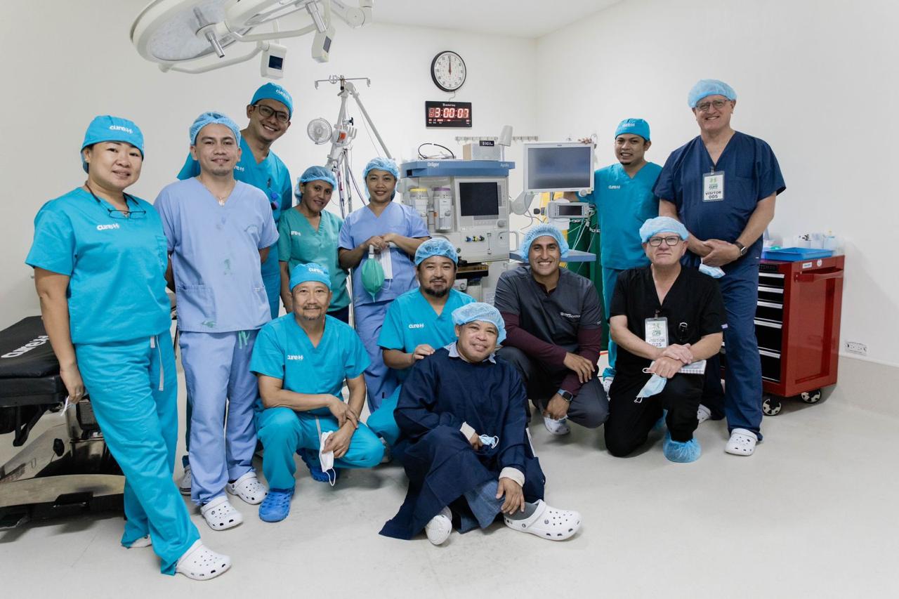 TRIMEDX Foundation volunteers with hospital site staff